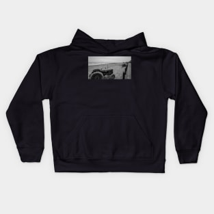 Tractor on Cromer beach on the North Norfolk coast Kids Hoodie